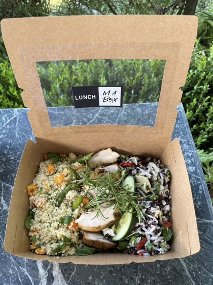 Deluxe Lunch Box Moroccan spiced chicken breast  Mixed leaf salad  Wild rice, artichoke & tomato salad, fresh herbs  Preserved lemon couscous, roast pumpkin, fresh herbs
